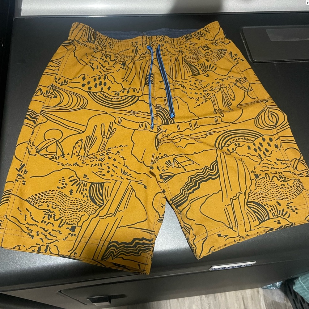 REI kids mustard Yellow Graphic Shorts- size 10-12 Like new
